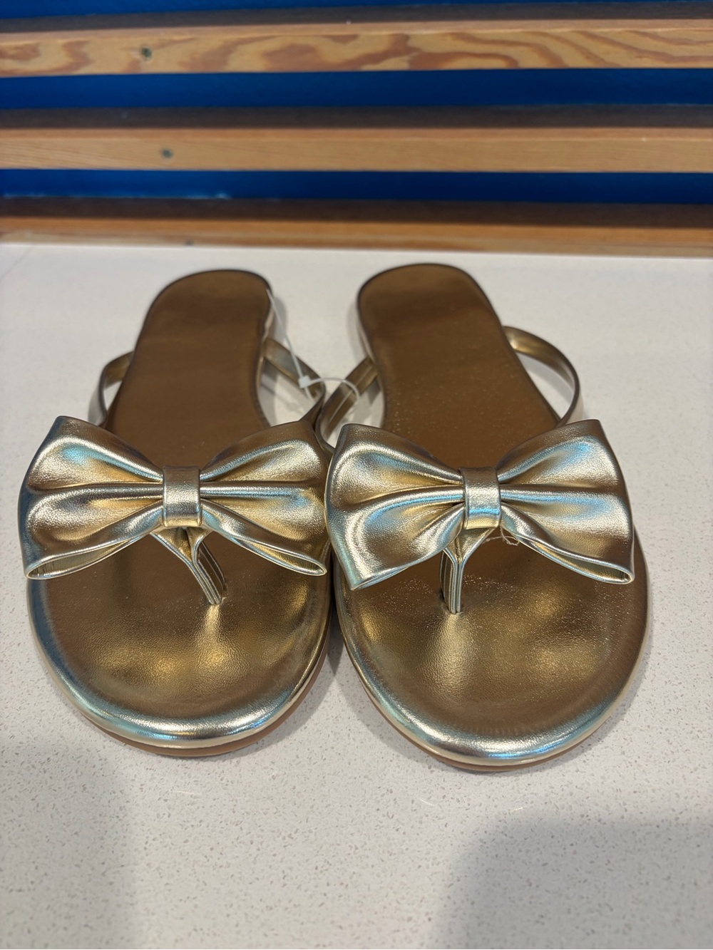 Women's Metallic Bow Thong Sandals - Gold Finish